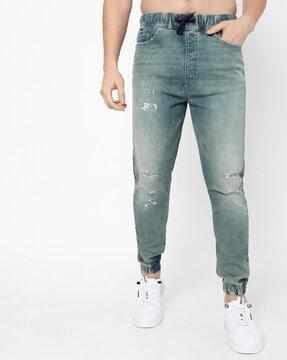 orson mid-wash distressed jogger jeans