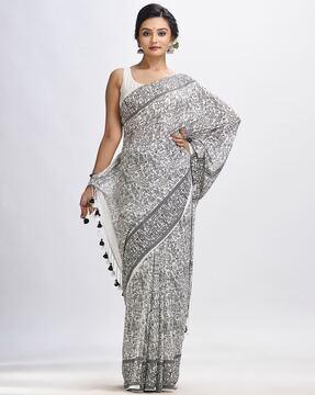 overall printed saree with tassels