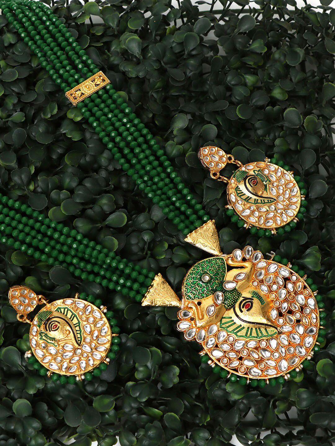 ozanoo gold-plated kundan-studded & pearl beaded jewellery set