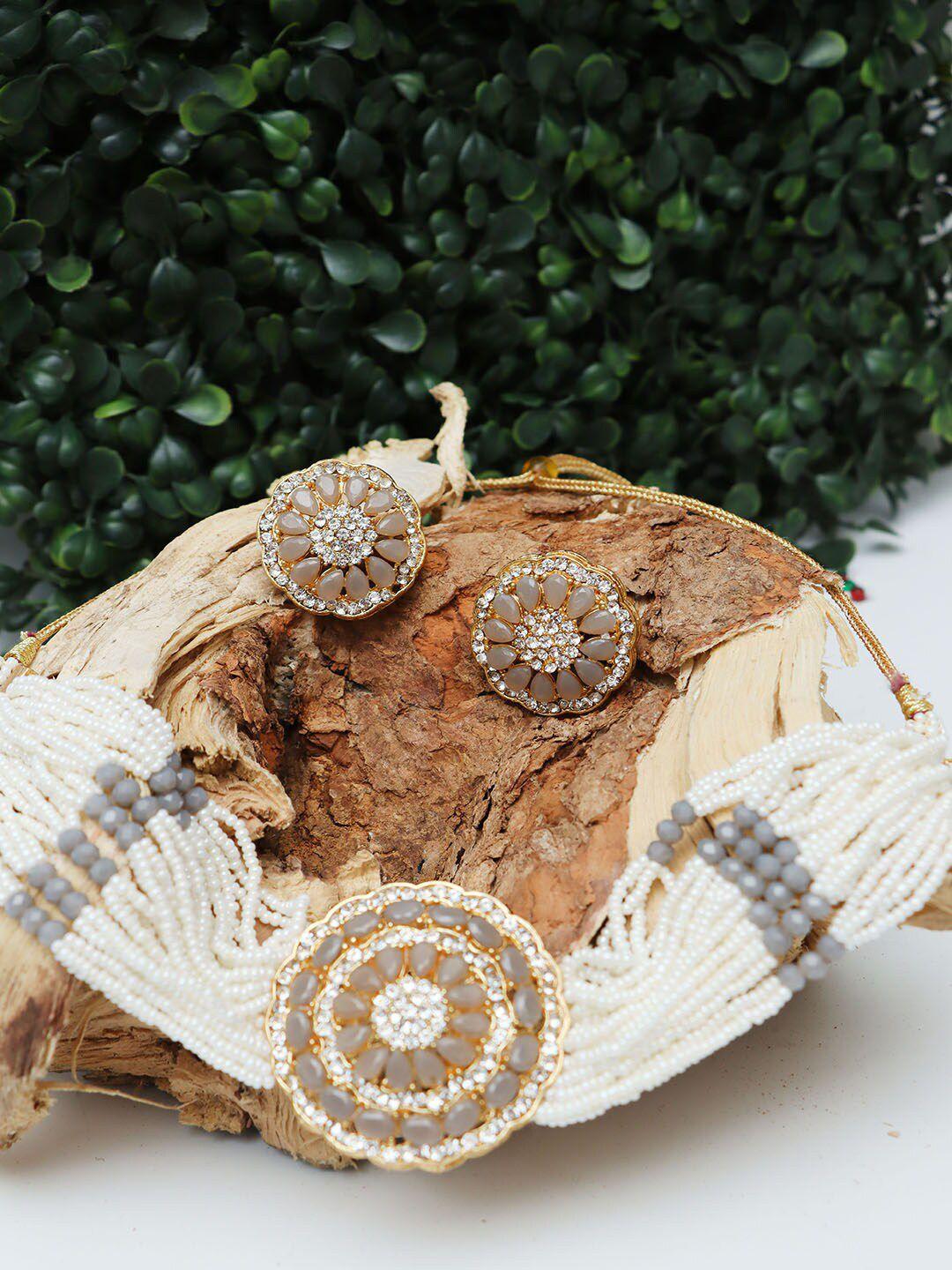 ozanoo gold-plated cz stone-studded & pearl beaded jewellery set