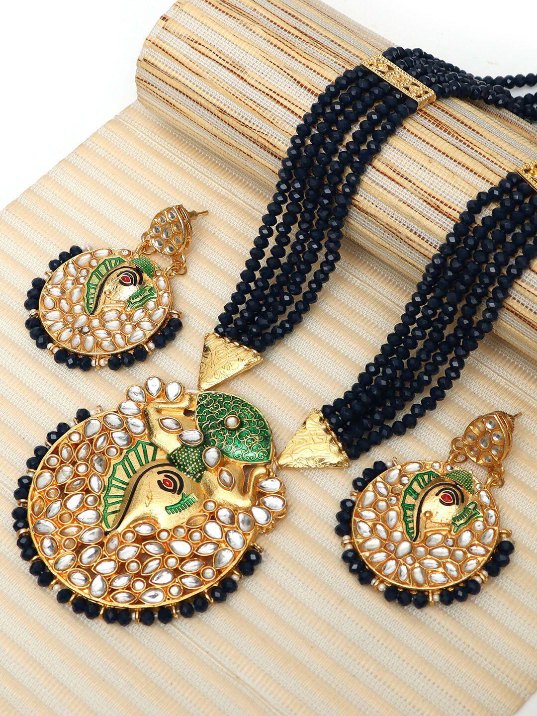 ozanoo gold-plated kundan studded & beaded jewellery set