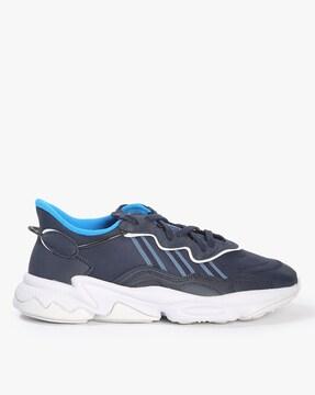 ozweego low-top lace-up running shoes