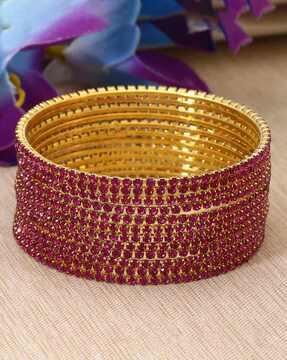 pack of 12 women gold-plated stone-studded bangles