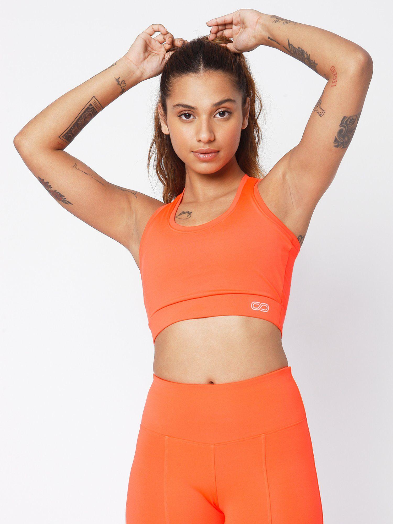 padded t back sports top in coral