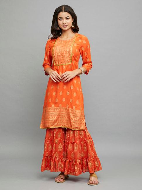 paislei orange printed kurta and sharara set