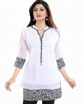 paisley print top with roll-up sleeves