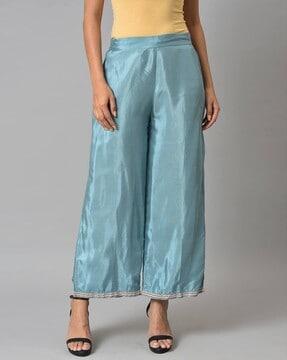 palazzos with hemline embellishment