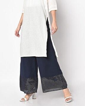 palazzos with polka-dot print hems