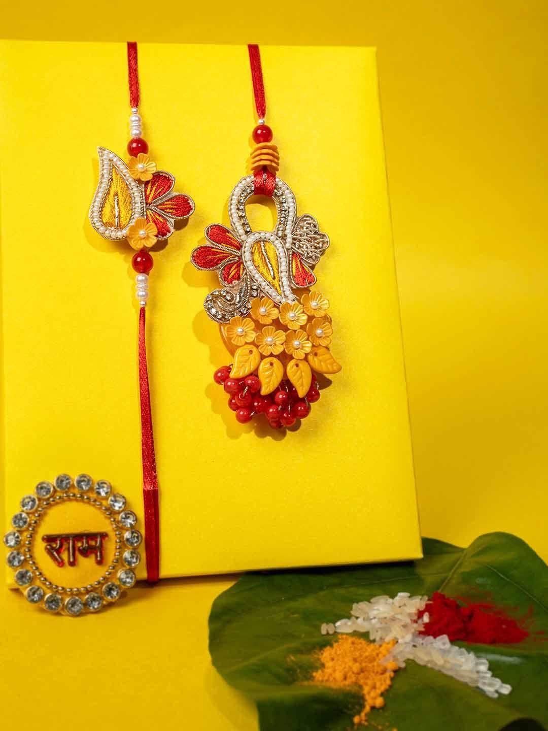 panash unisex set of 2 floral shaped embellished rakhi with roli chawal