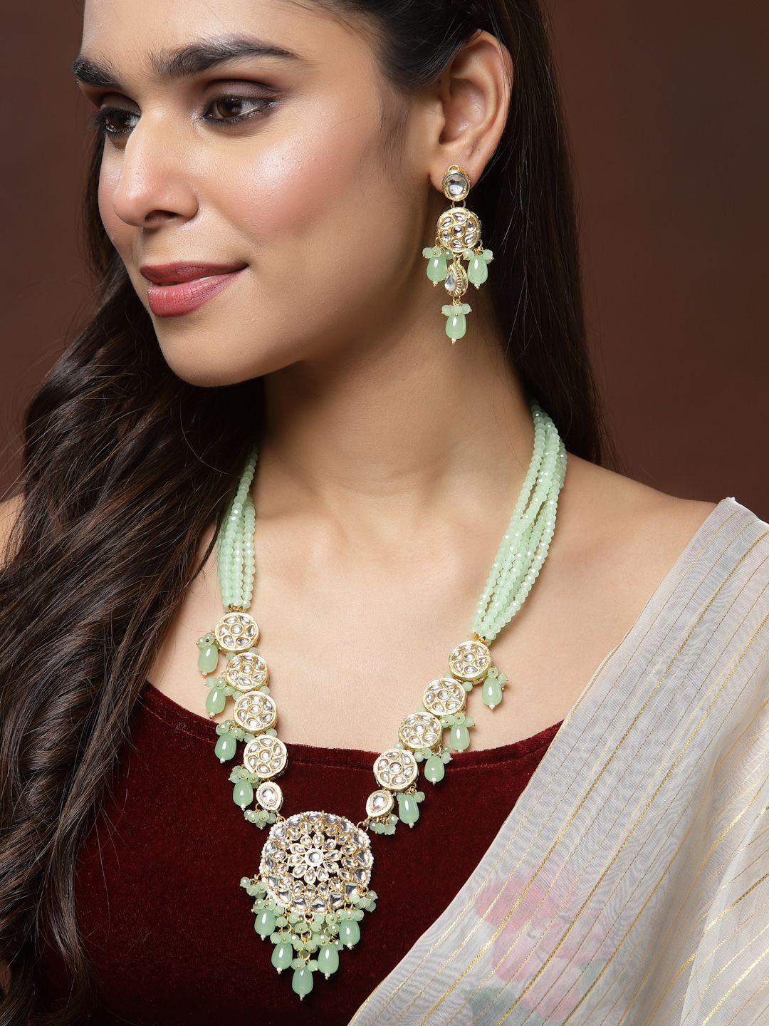 panash gold-plated kundan-studded & pearl beaded jewellery set