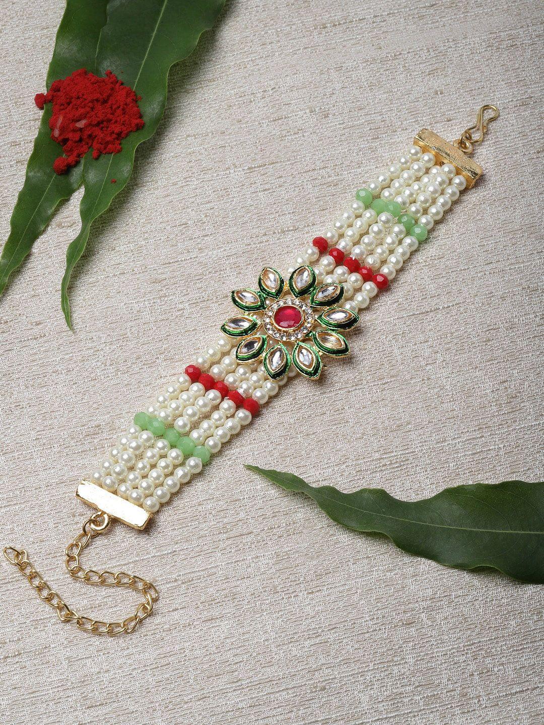 panash gold-toned & white kundan & pearls bracelet style rakhi with roli chawal