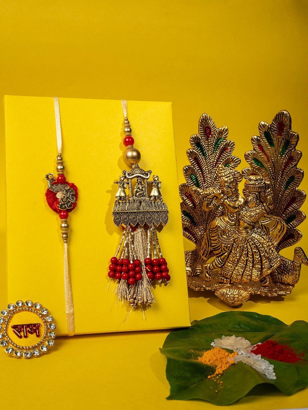 panash set of 2 gold-plated rakhis with radha krishna & roli chawal