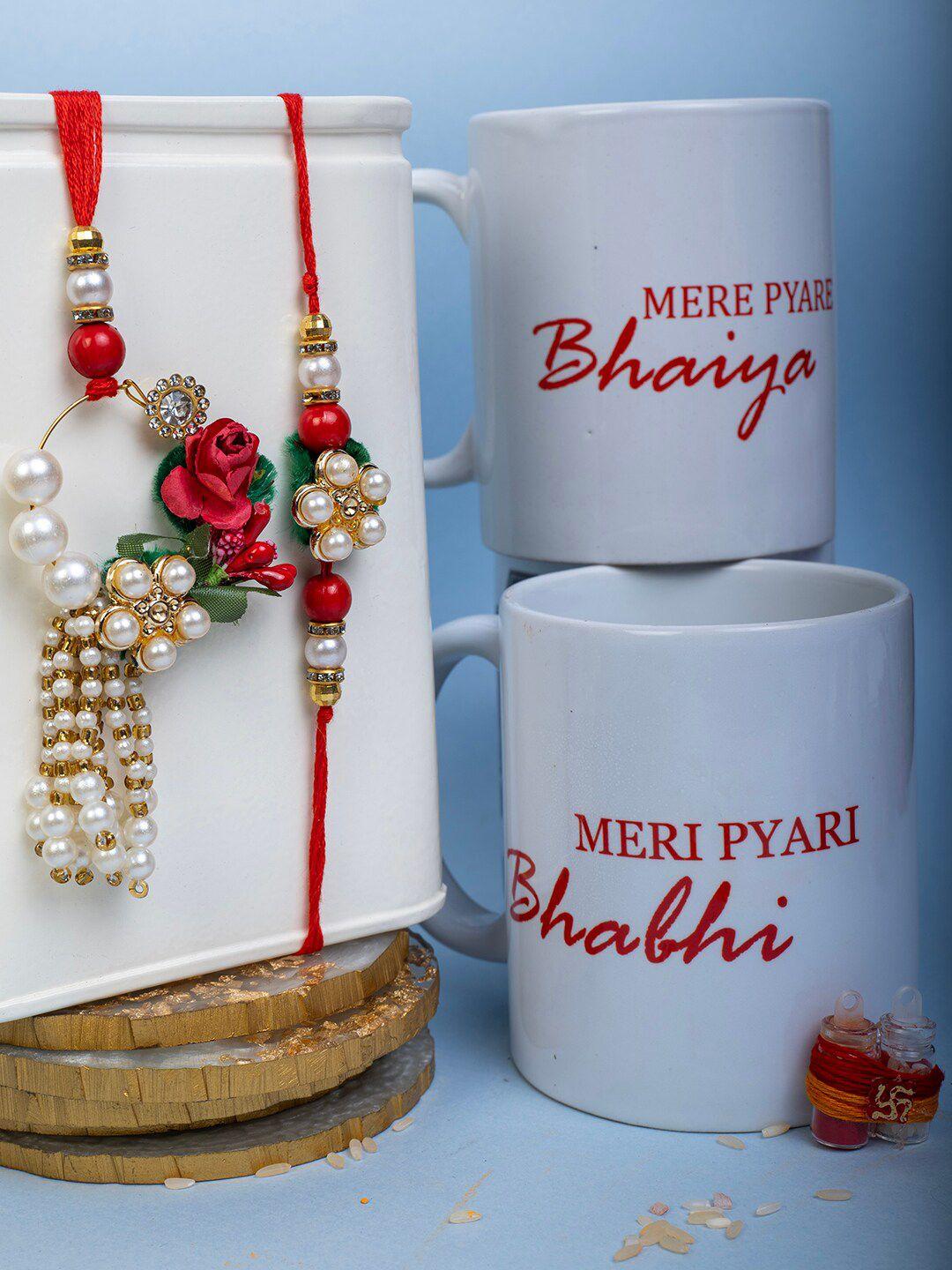 panash set of 3 gold-plated floral pearl rakhi with mug & roli chawal