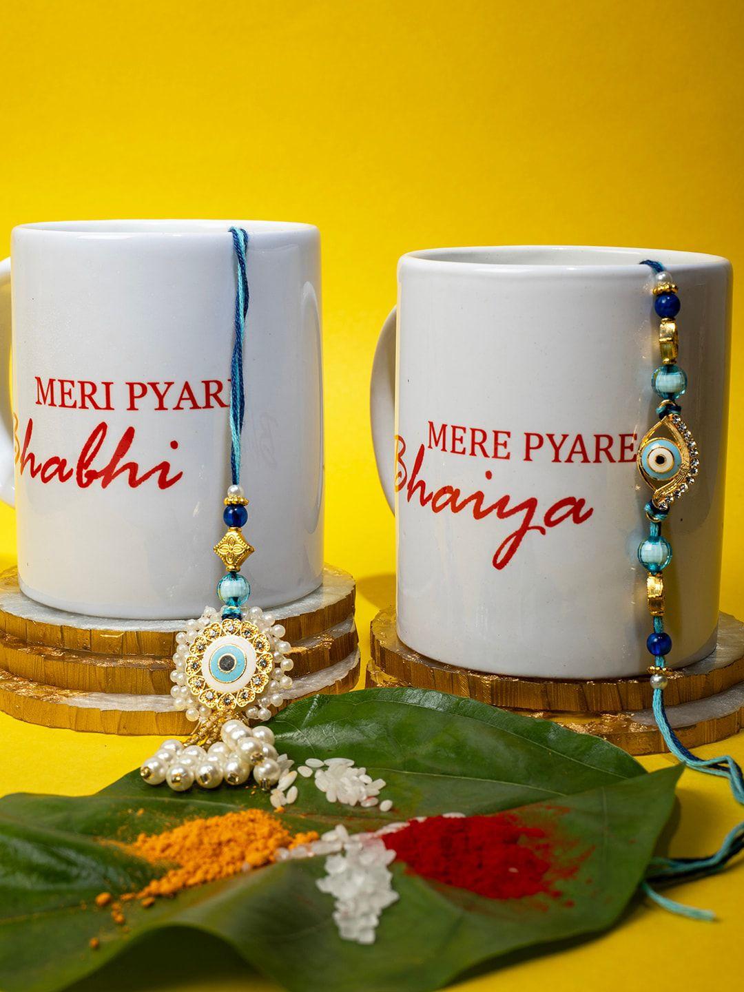 panash unisex set of 2 gold-plated evil eye charm rakhi with mugs & roli chawal