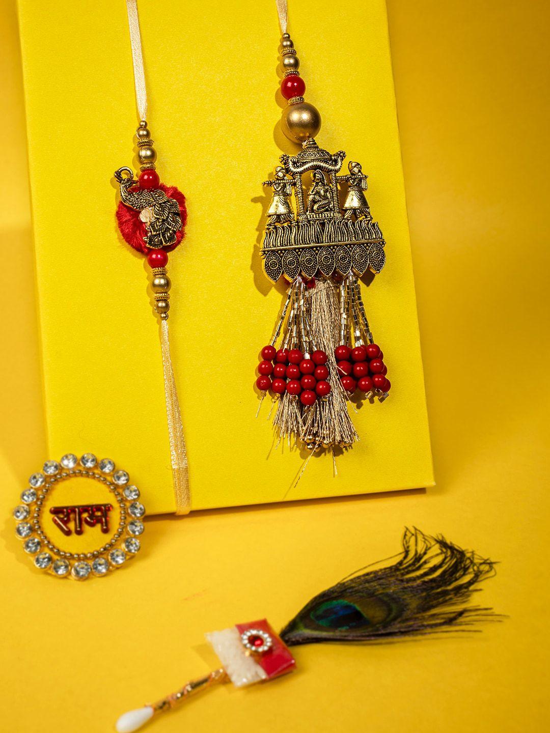panash unisex set of 2 gold-plated peacock shaped bhaiya bhabhi embellished rakhi gift set