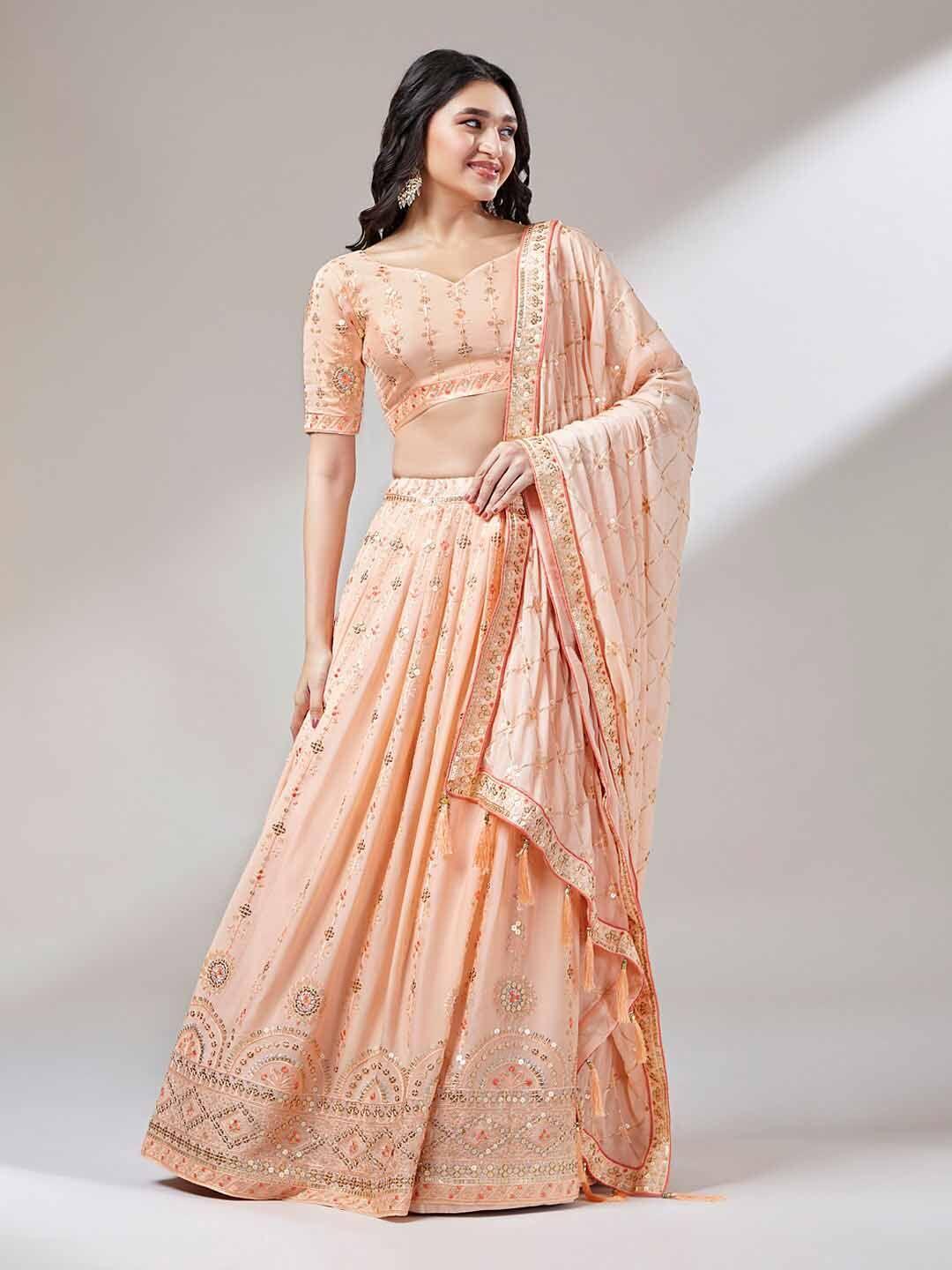 panchhi peach-coloured & gold-toned embroidered sequinned semi-stitched lehenga & unstitched blouse with