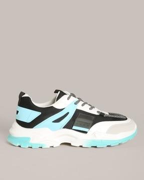 paneled lace-up sports shoes