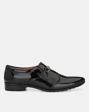 panelled slip-on shoes with metal accent