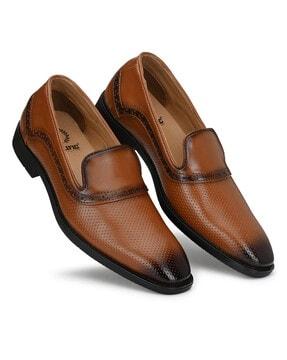 panelled slip-on formal shoes with broguing