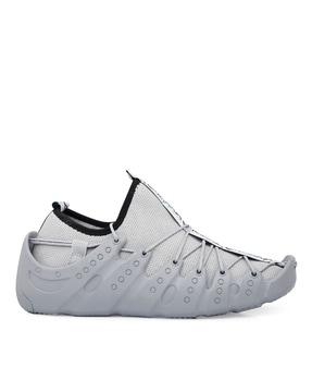 panelled sports shoes with lace fastening