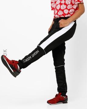 panelled track pants with elasticated drawstring waist