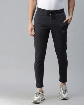 panelled track pants with insert pockets