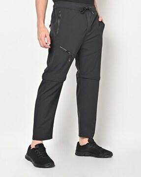 panelled track pants with insert zip pockets