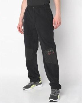 panelled track pants with placement logo print