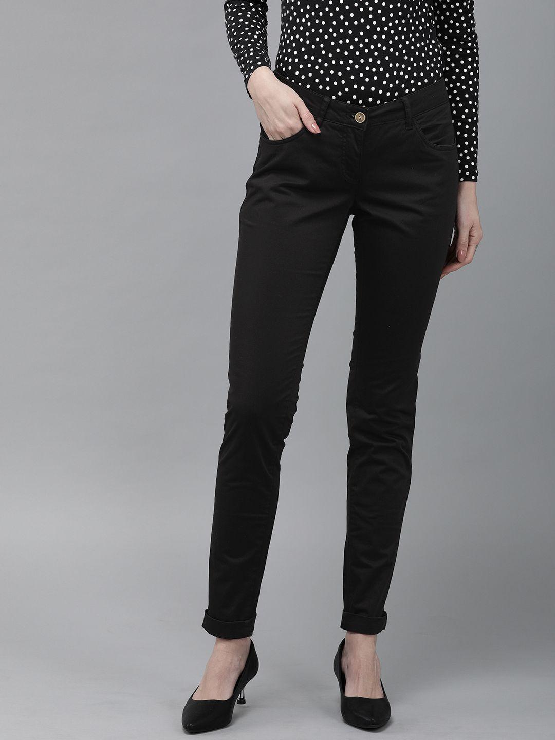 park avenue women black tapered fit solid formal trousers