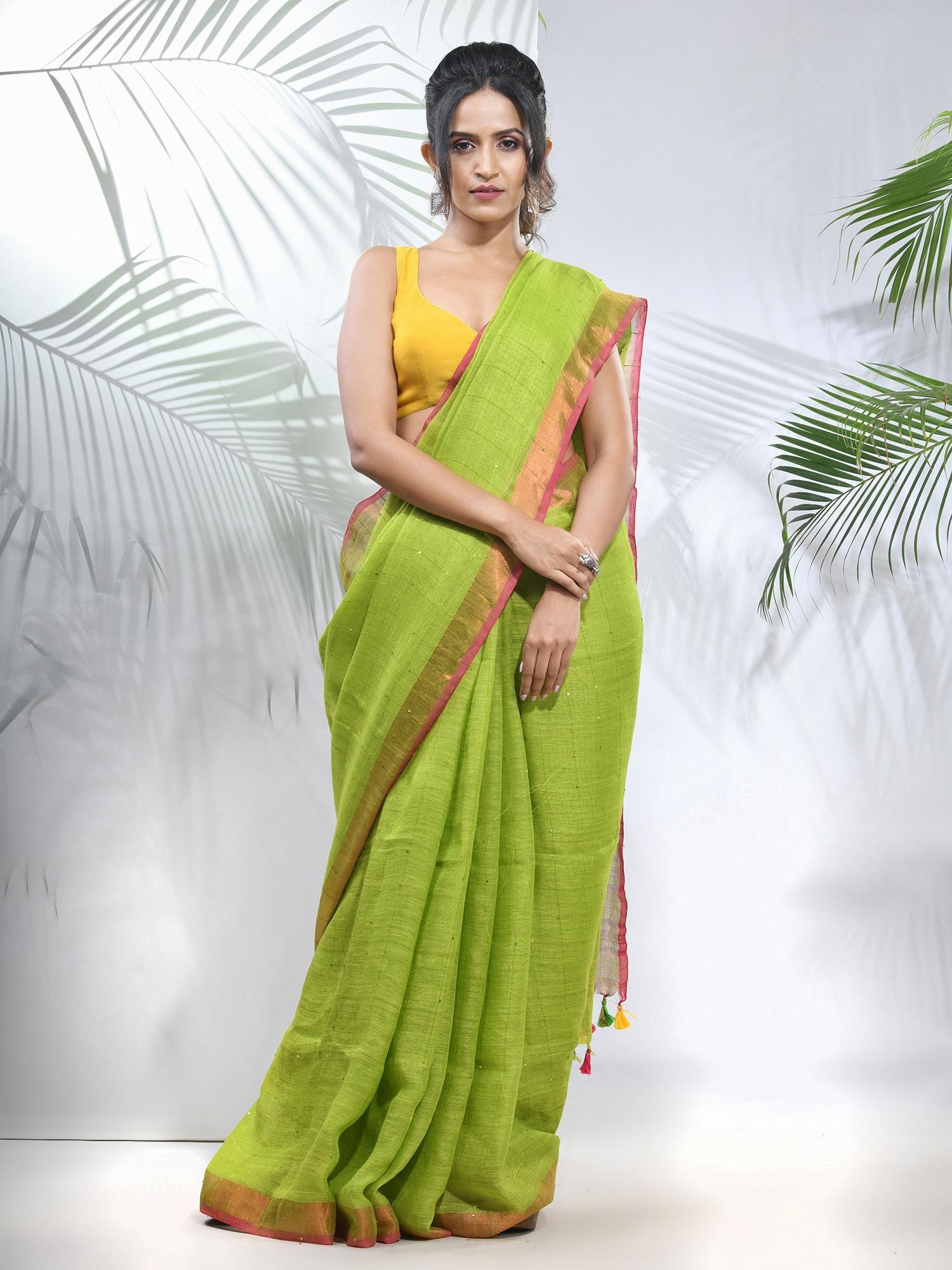 parrot green linen saree with sequined work in stripes pallu with unstitched blouse