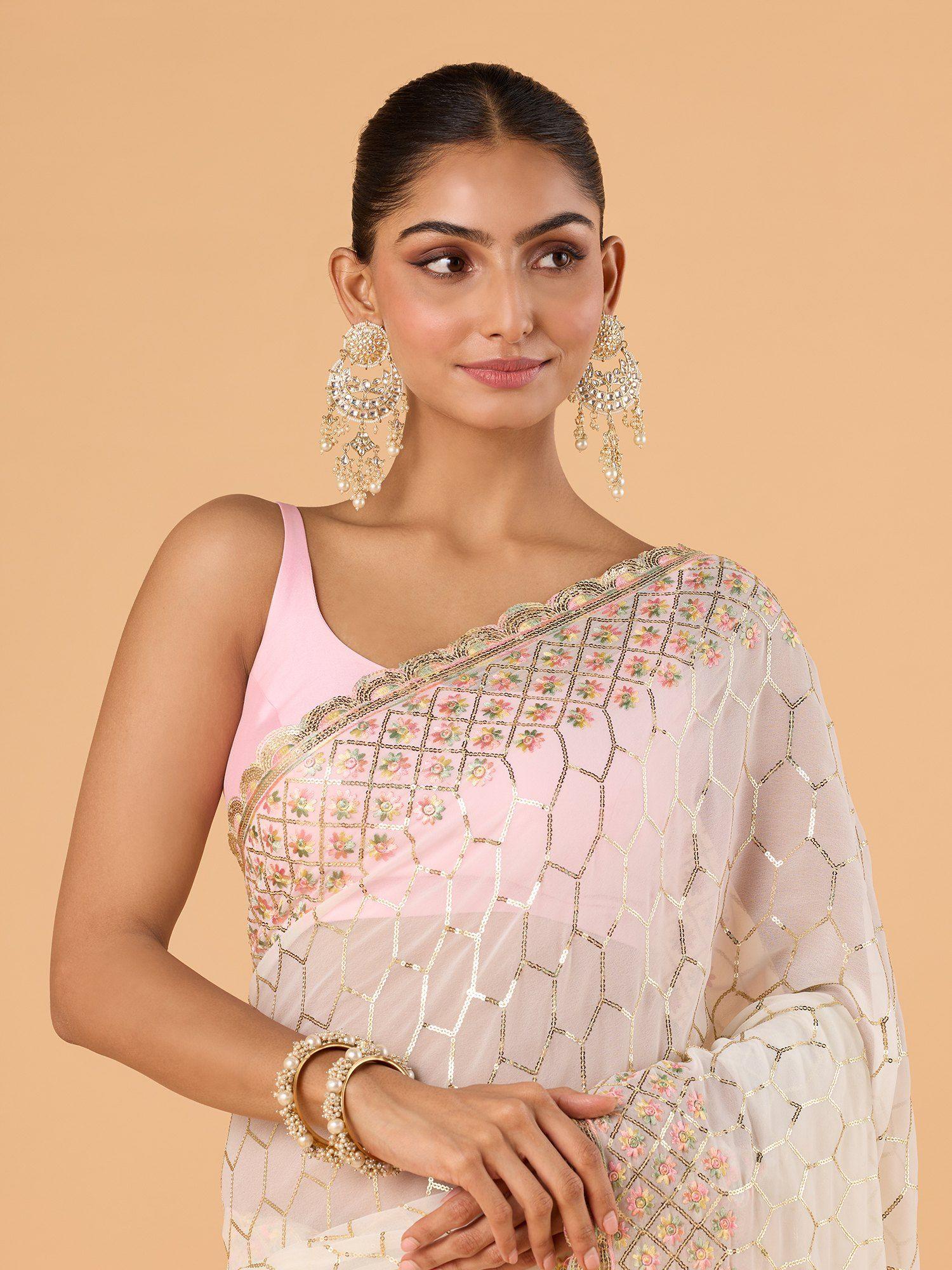 party heavy embroidered with scallop floral border georgette off white saree and blouse pc.