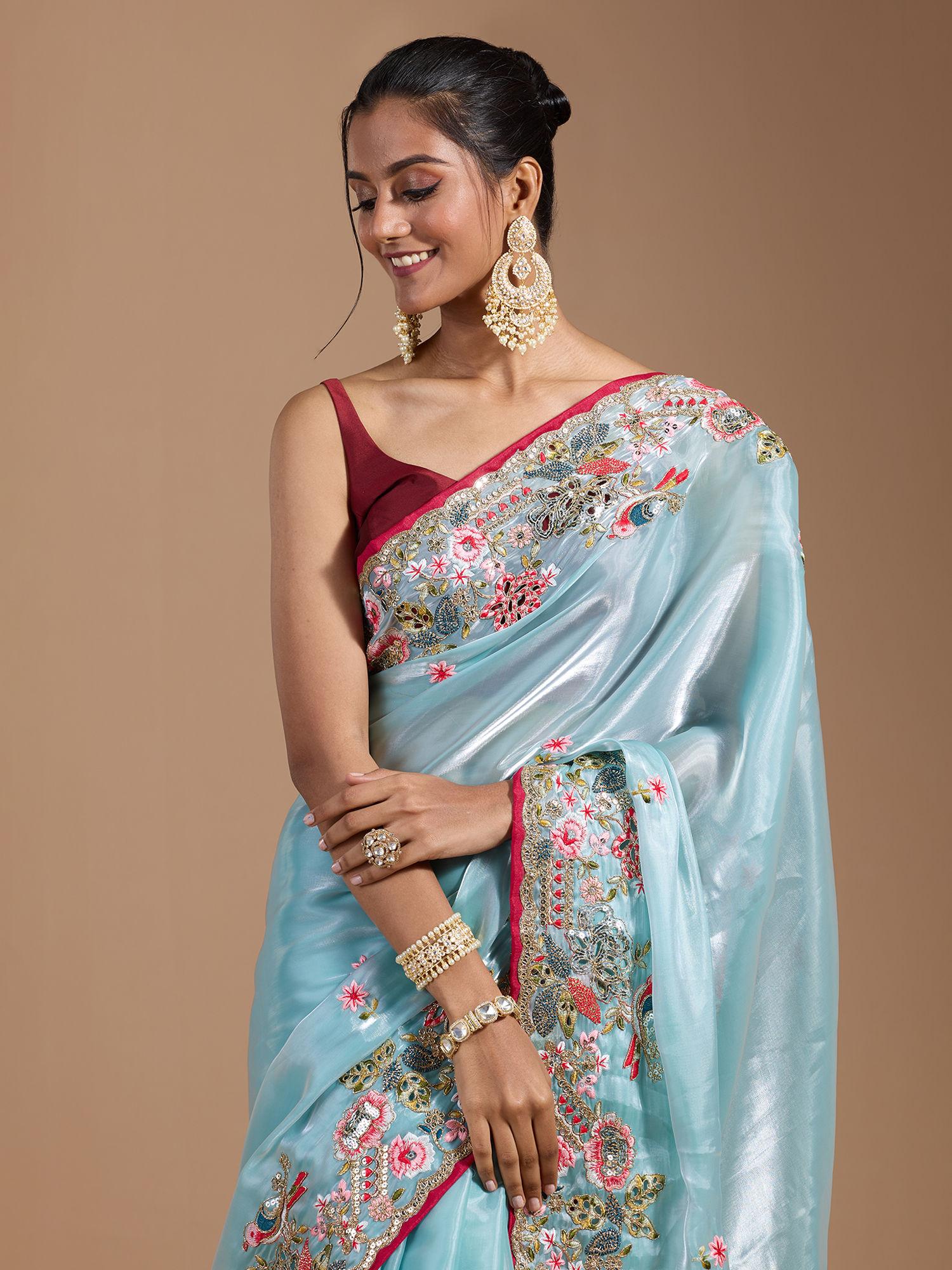 party heavy floral embroidered contrast border organza blue saree with unstitched blouse