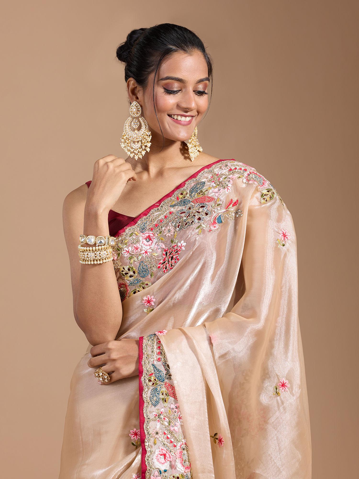 party heavy floral embroidered contrast border organza gold saree with unstitched blouse