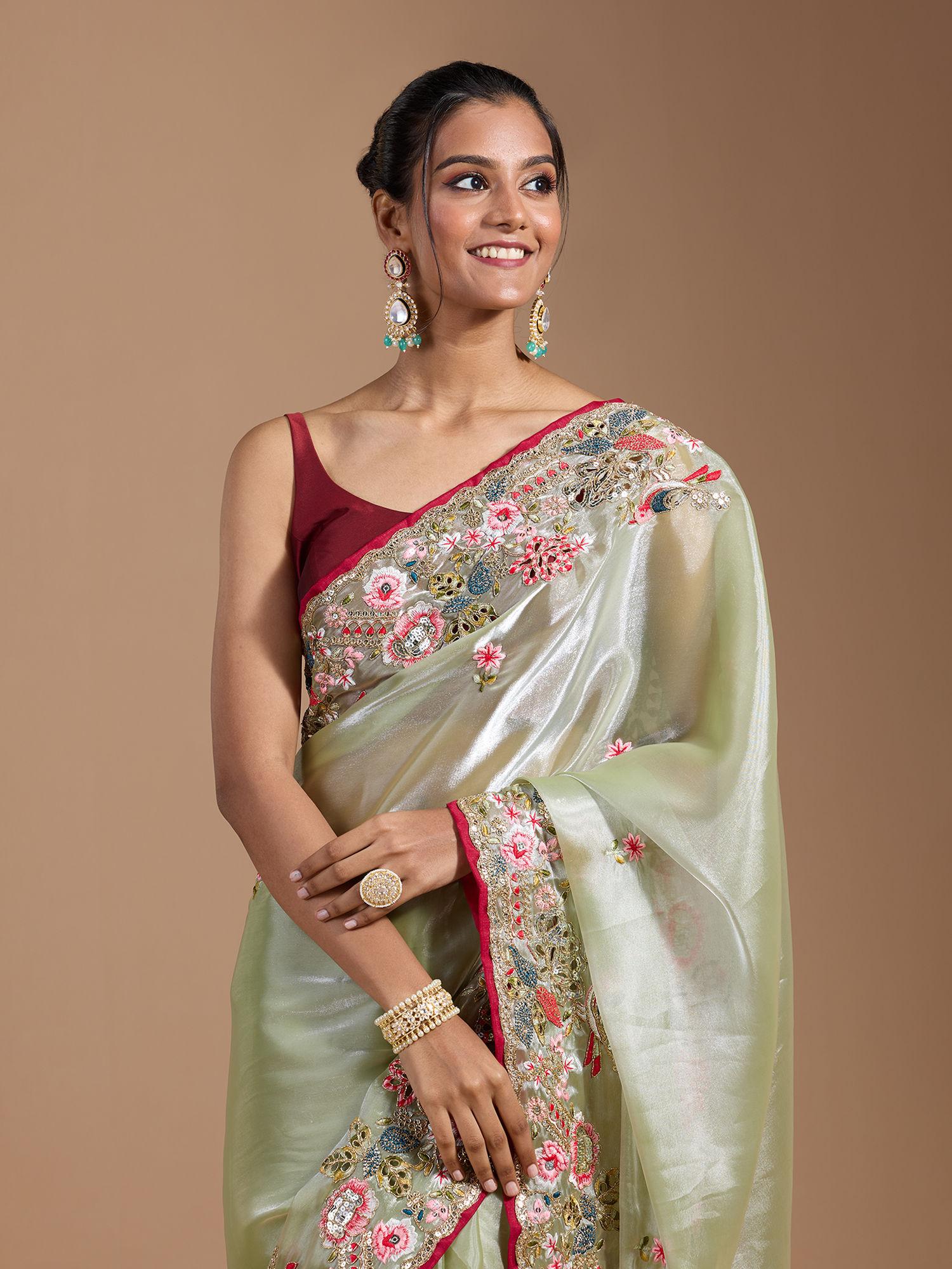 party heavy floral embroidered contrast border organza green saree with unstitched blouse