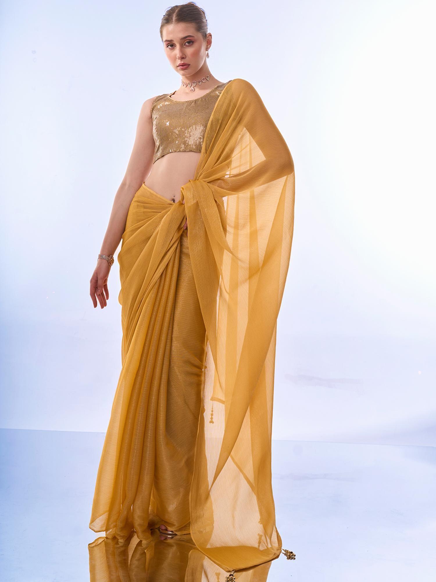 party shiny solid chiffon mustard saree with unstitched golden sequin blouse