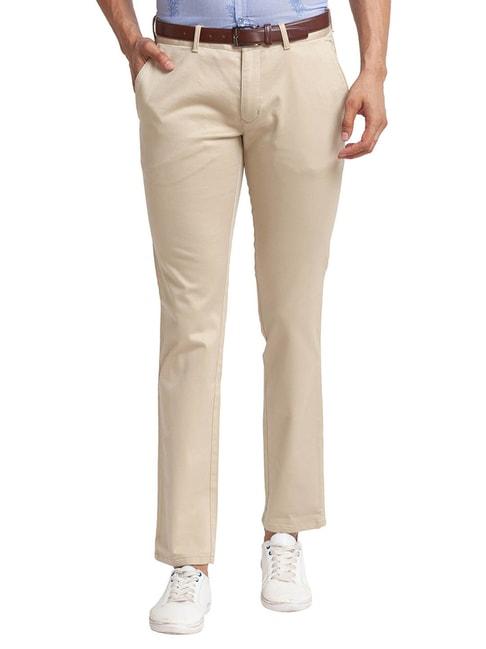 parx beige tapered fit self pattern trousers