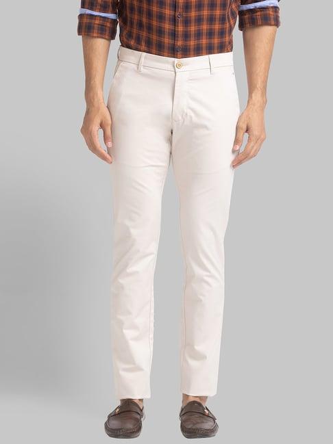 parx cream tapered fit trousers