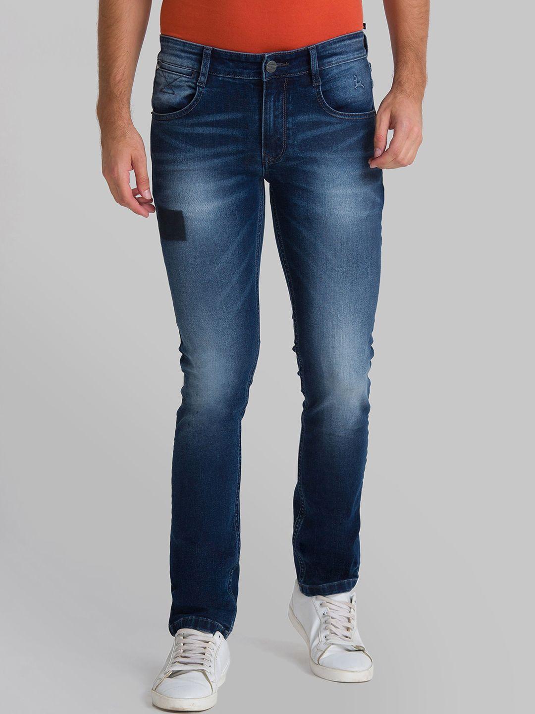 parx men blue tapered fit low distress heavy fade jeans