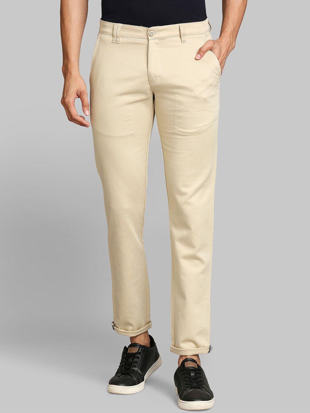 parx men cream solid tapered fit trousers