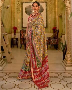 patola print saree with contrast zari border