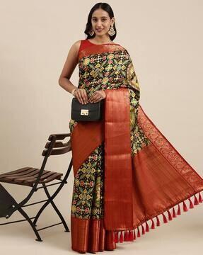 patola woven saree with peacock woven border & tassels