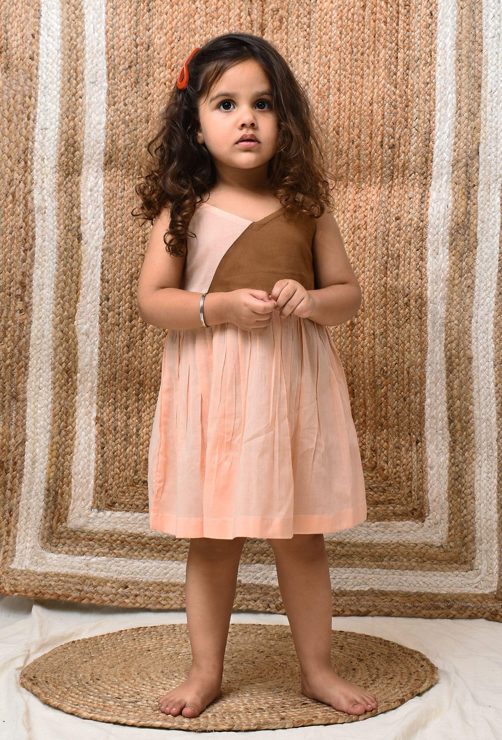 peach and brown mul mul dress