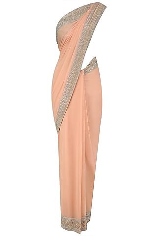 peach and gold embroidered saree and blouse set