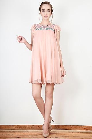 peach dress with ruffled sleeves