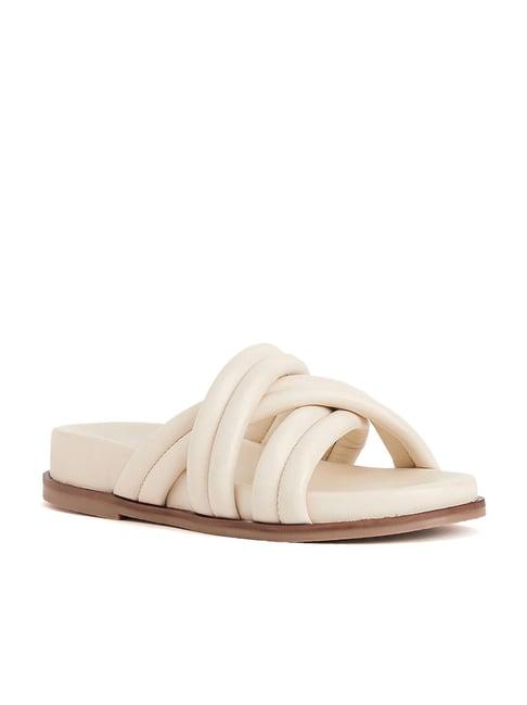 peach flores women's ivory cross strap sandals