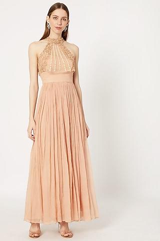 peach gown with embroidered cape