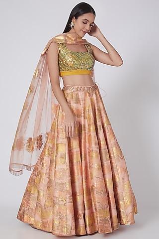 peach lehenga set with gold foil work