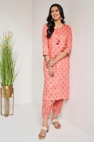 peach print ethnic tie-up neck 3/4th sleeves ankle-length women regular fit pant kurta set