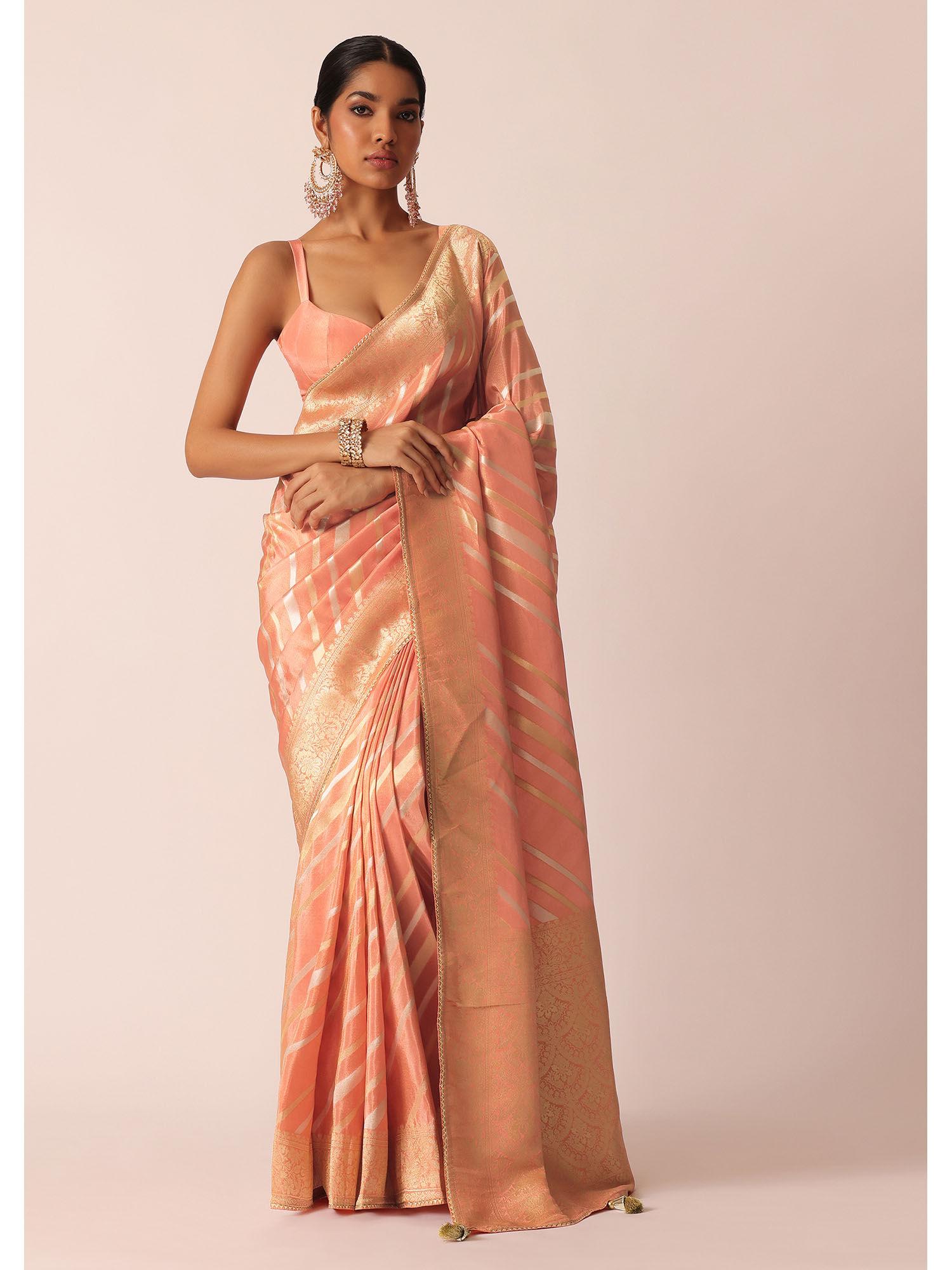 peach tissue silk saree with gold stripes and unstitched blouse