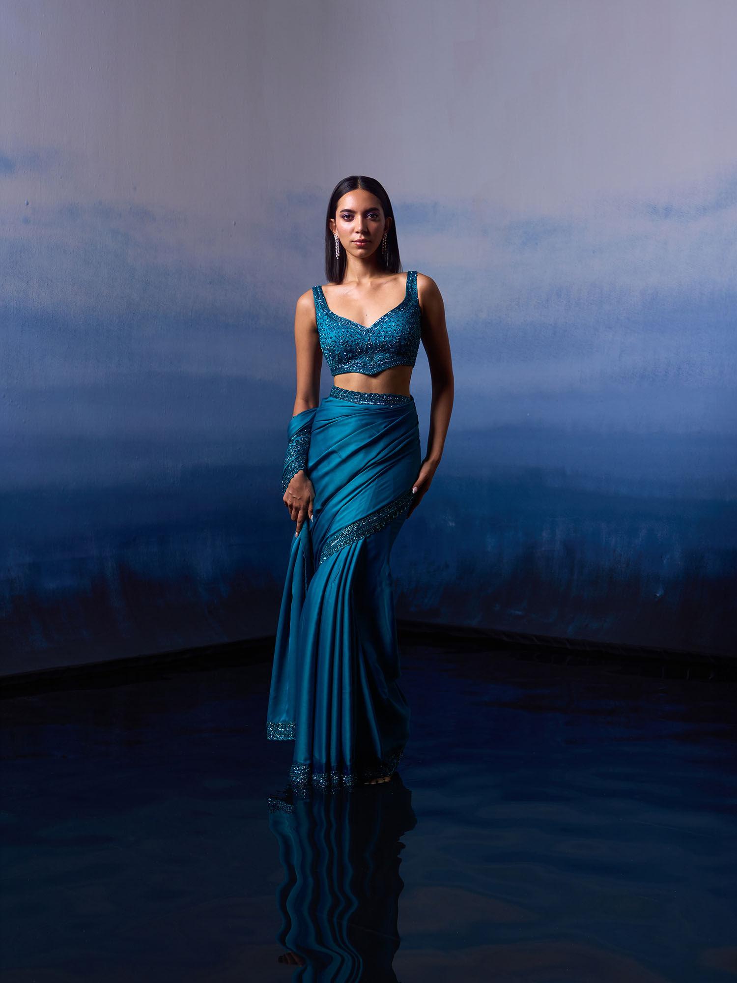 peacock blue satin saree with stitched blouse and petticoat